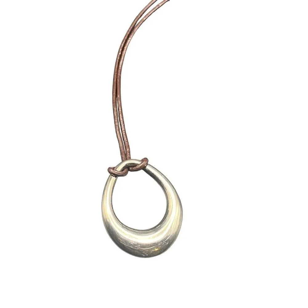 Premier Designs black adjustable cord necklace with silver teardrop pendant!